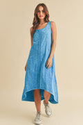 Model wearing a comfortable midi tank dress with a stylish high-low hemline