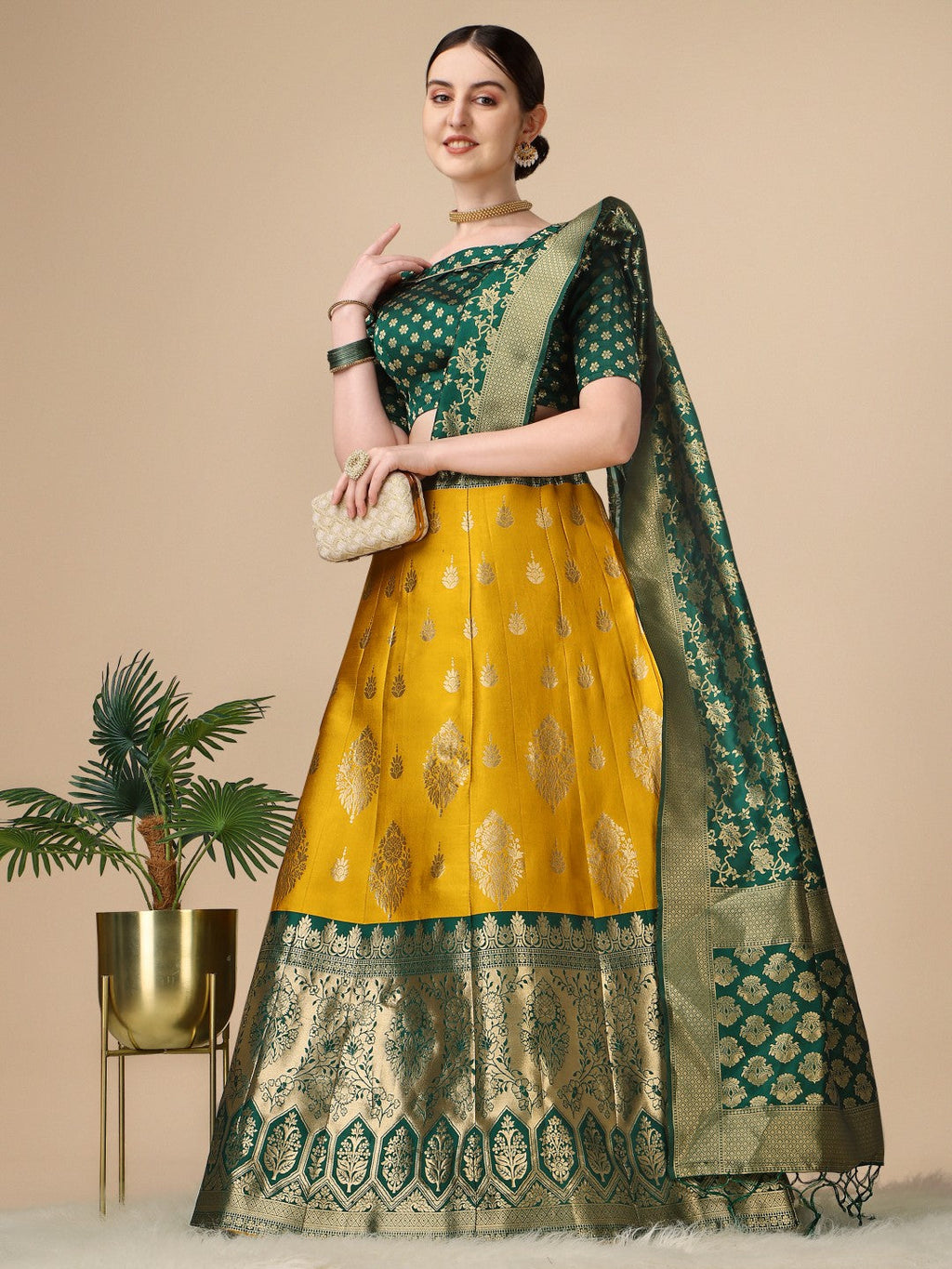 Yellow brocade lehenga choli set with dupatta and unstitched blouse