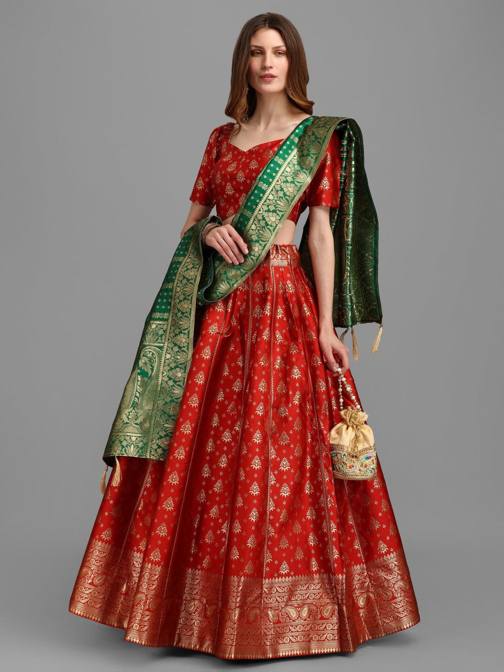 A beautiful red brocade lehenga with intricate jacquard work and matching dupatta