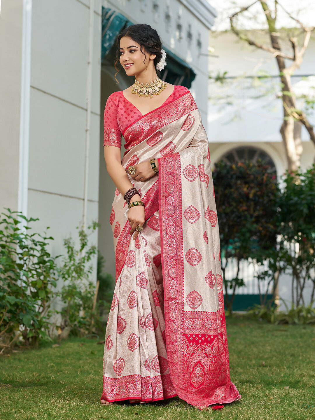 Elegant cream and red silk blend saree with matching blouse piece