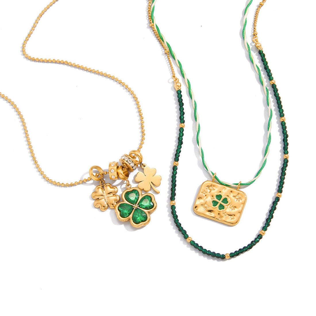 Polished green clover pendant necklace with zircon accents on a gold-tone stainless steel chain