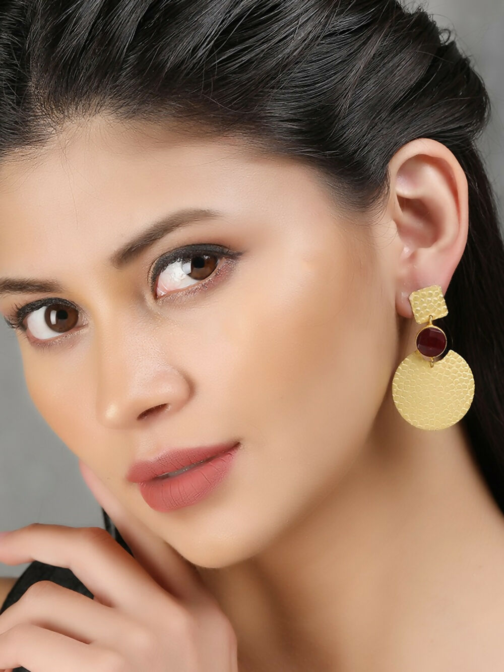 Round shape red and gold matte brass earrings for women.
