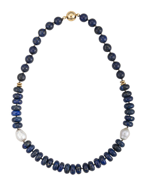 A 19-inch necklace featuring deep blue lapis lazuli beads, white freshwater Edison pearls, and small gold-tone hematite accents with a magnetic clasp.