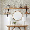 Onyx floral pattern wallpaper in sage green and off-white.