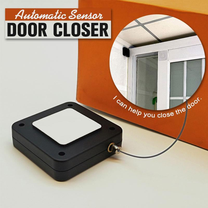 Minimalist black automatic door closer installed on a modern interior door for hands-free closing