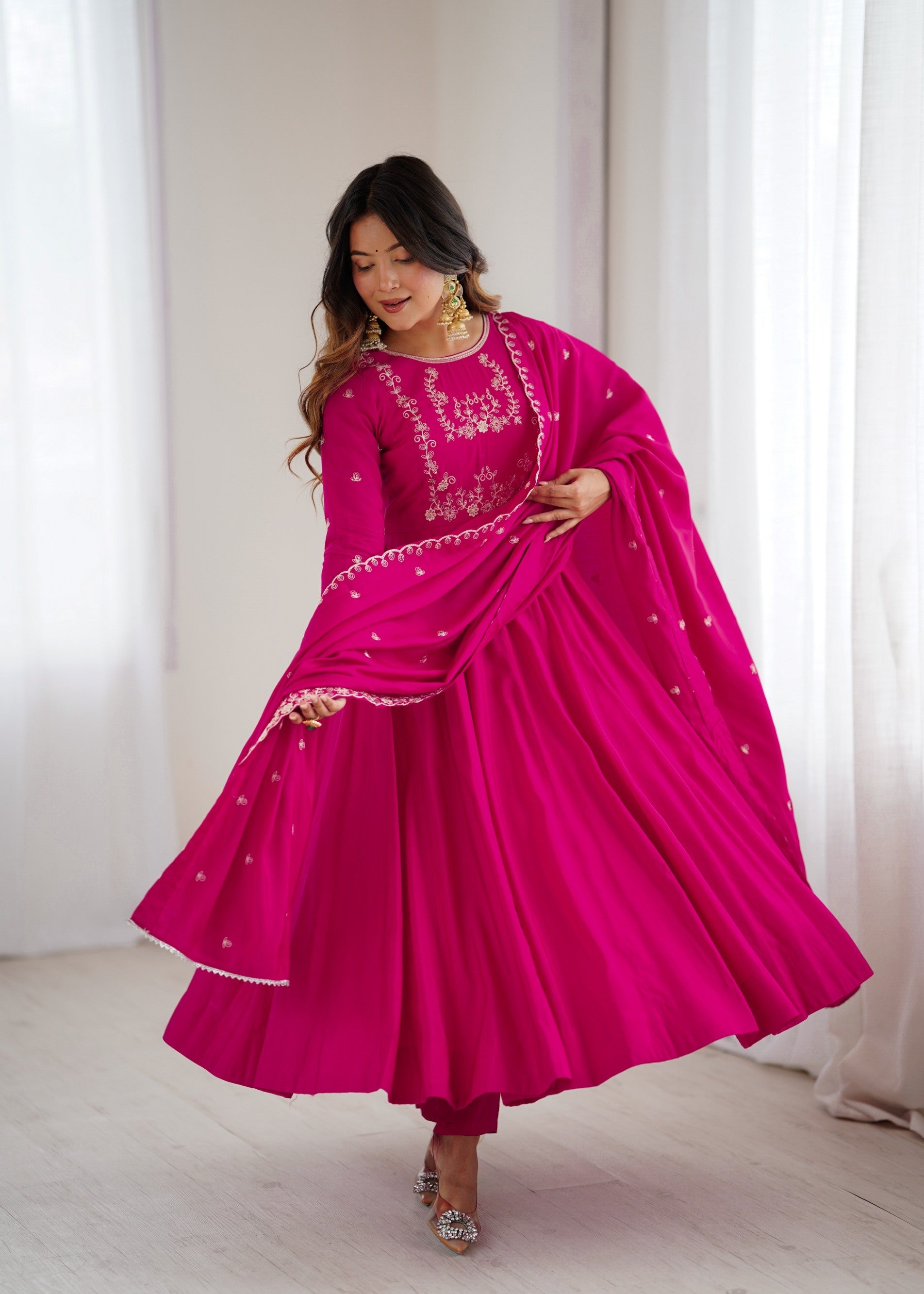 Darkpink Chanderi silk Anarkali gown with intricate handwork and beaded yoke detail