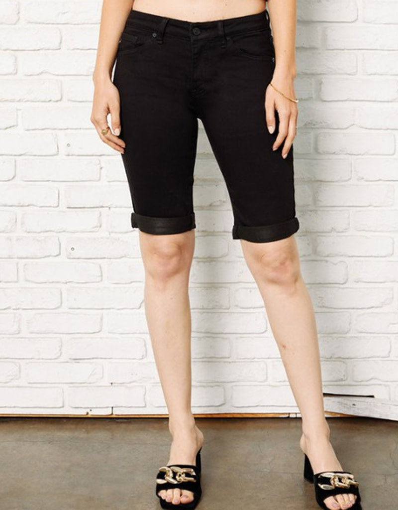 A pair of sleek black Bermuda shorts with an 11-inch inseam and comfortable stretch cotton fabric.