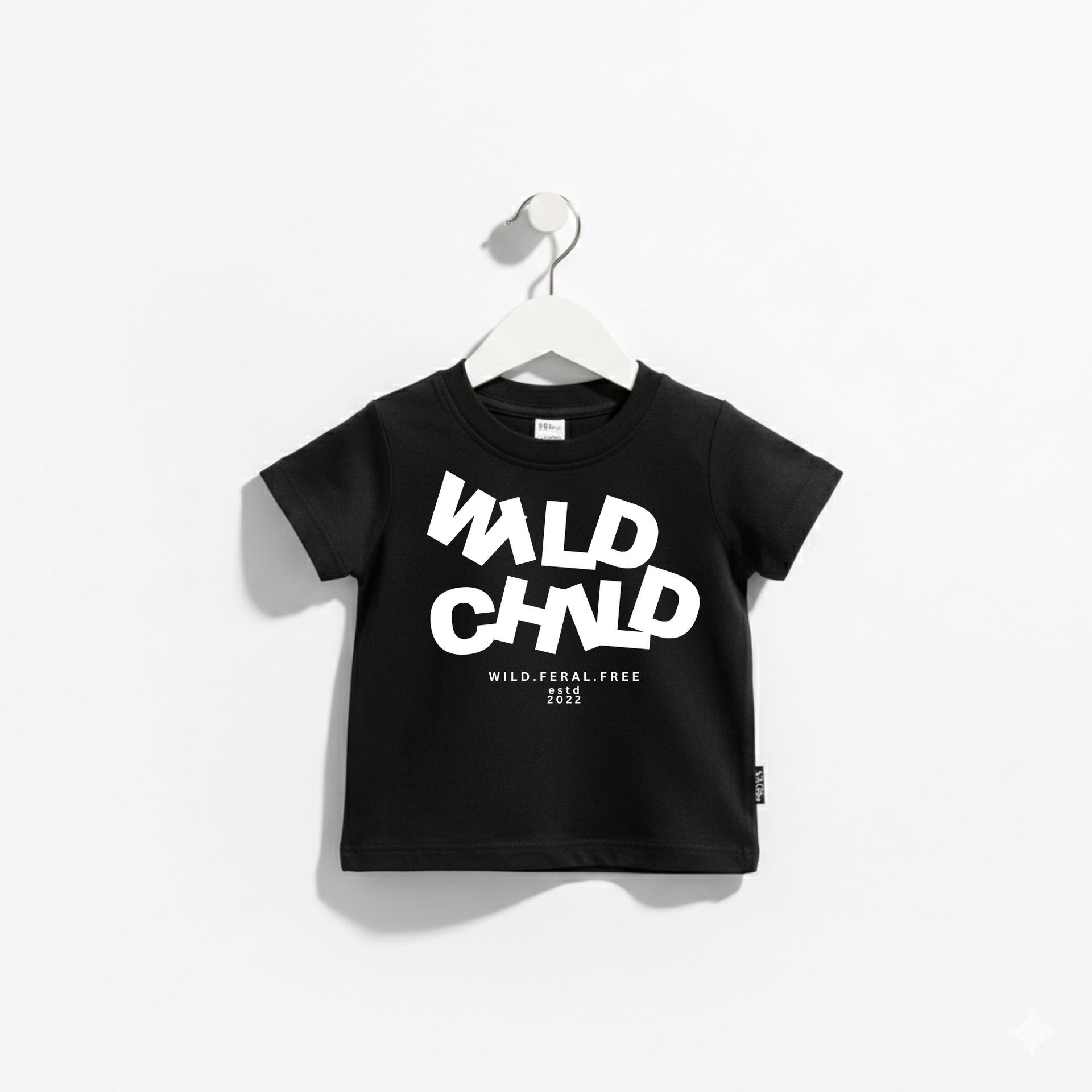 Minimalist Wild Child kids graphic tee in solid black or white cotton.