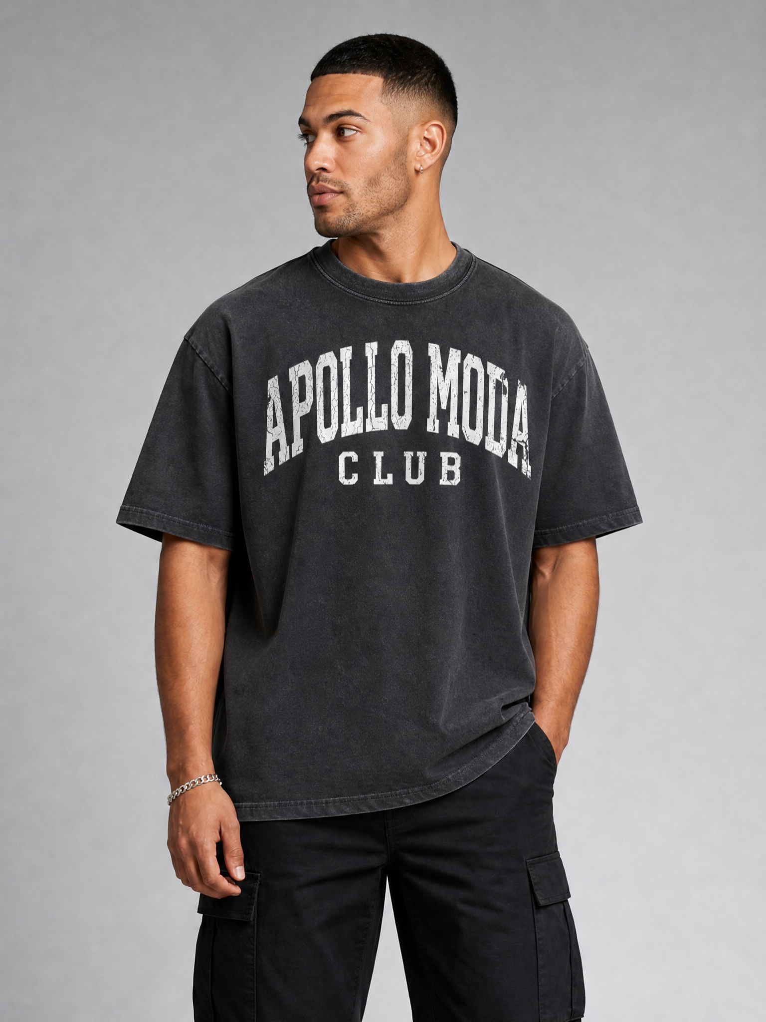 Men wearing a charcoal and off-white gradient washed oversized collegiate tee