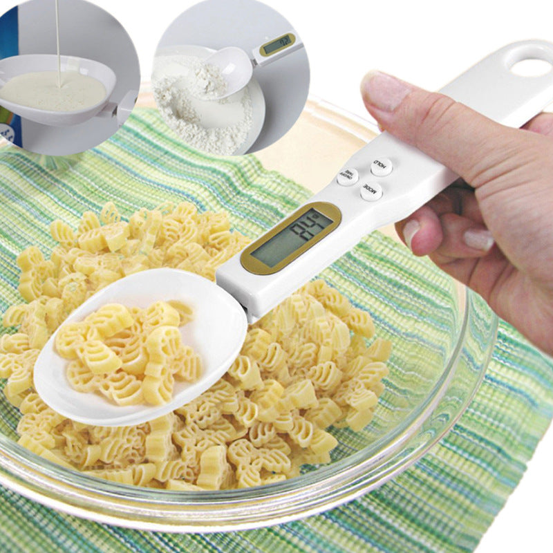Digital LCD spoon scale displaying weight for precise food and coffee measurement
