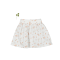 A white woven skirt with a seashell-themed floral print displayed flat against a plain background.