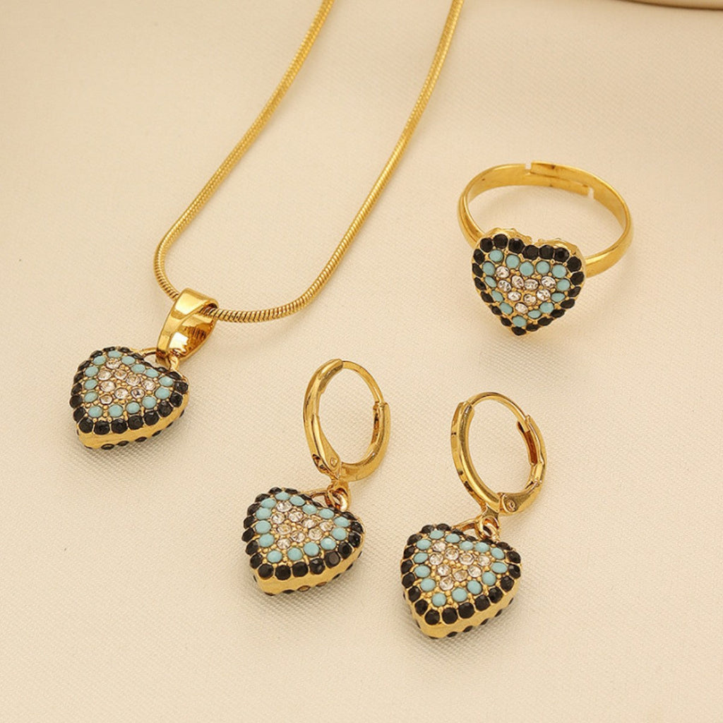 Gold-tone crystal heart evil eye necklace, earrings, and open ring set