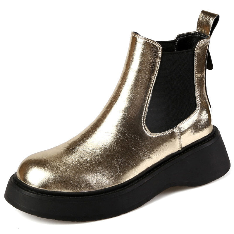 Women's metallic gold and silver cow leather Chelsea ankle boots with a chunky platform sole.