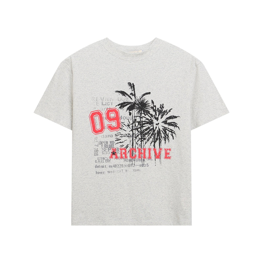 A flat lay image of a women's short-sleeve t-shirt with a distressed palm tree and 'ARCHIVE' letter graphic in both Flower Grey and Black.