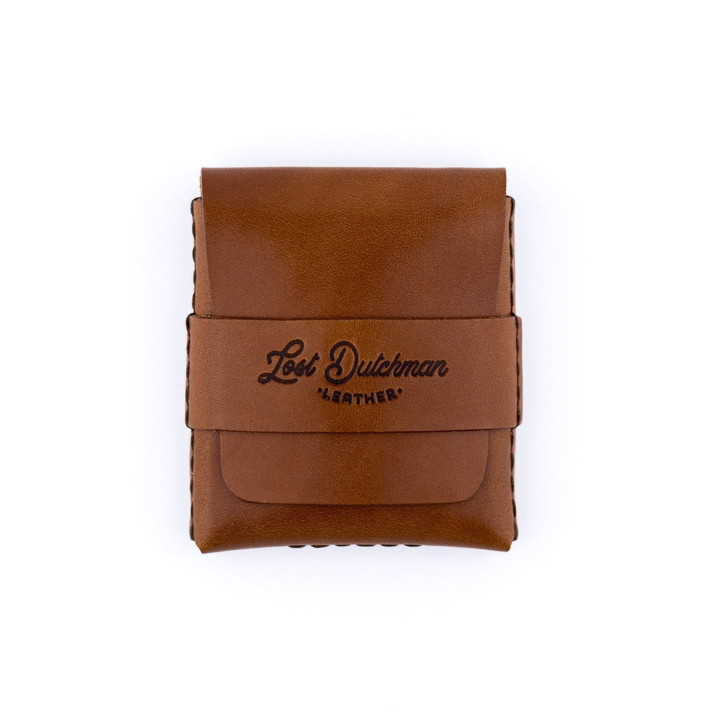 Brown full-grain cowhide leather The Big Finn card holder on a neutral background