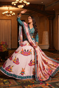 Light pink and teal designer crepe lehenga choli for Navratri wear.