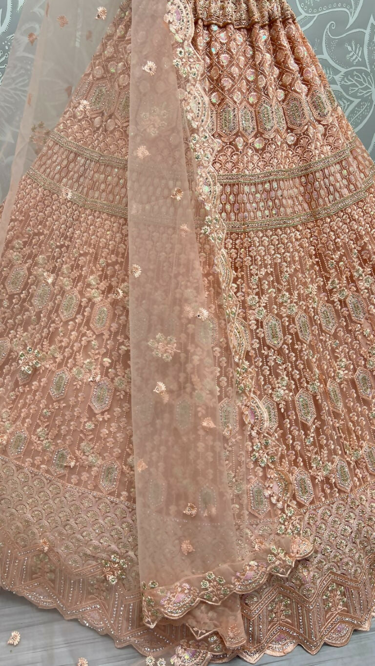 Peach Heavy Net Embroidered Wedding Lehenga Choli with Sequins