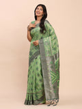 Solid green linen cotton saree with matching green blouse piece.