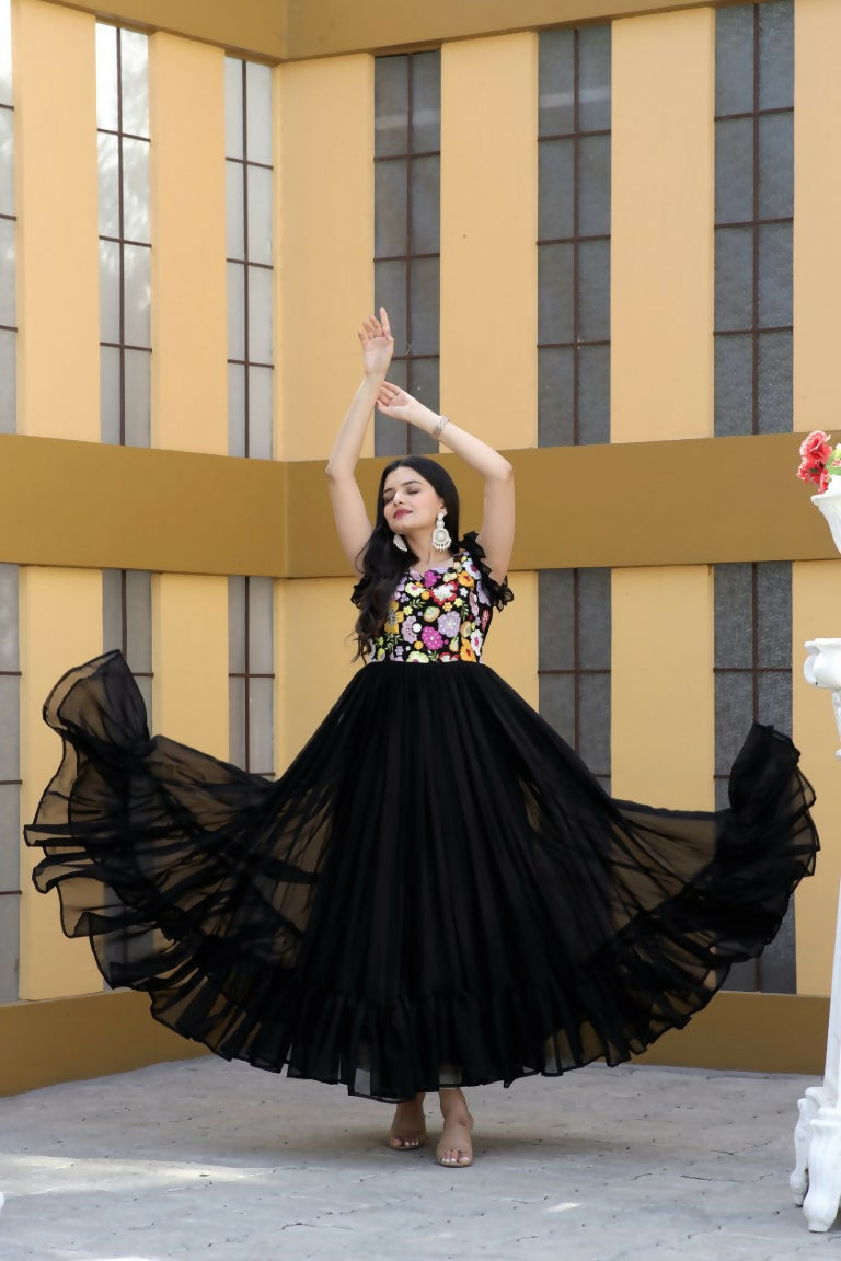 Black floor-length Anarkali dress featuring multi-colored floral thread embroidery and sequins.