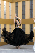 Black floor-length Anarkali dress featuring multi-colored floral thread embroidery and sequins.