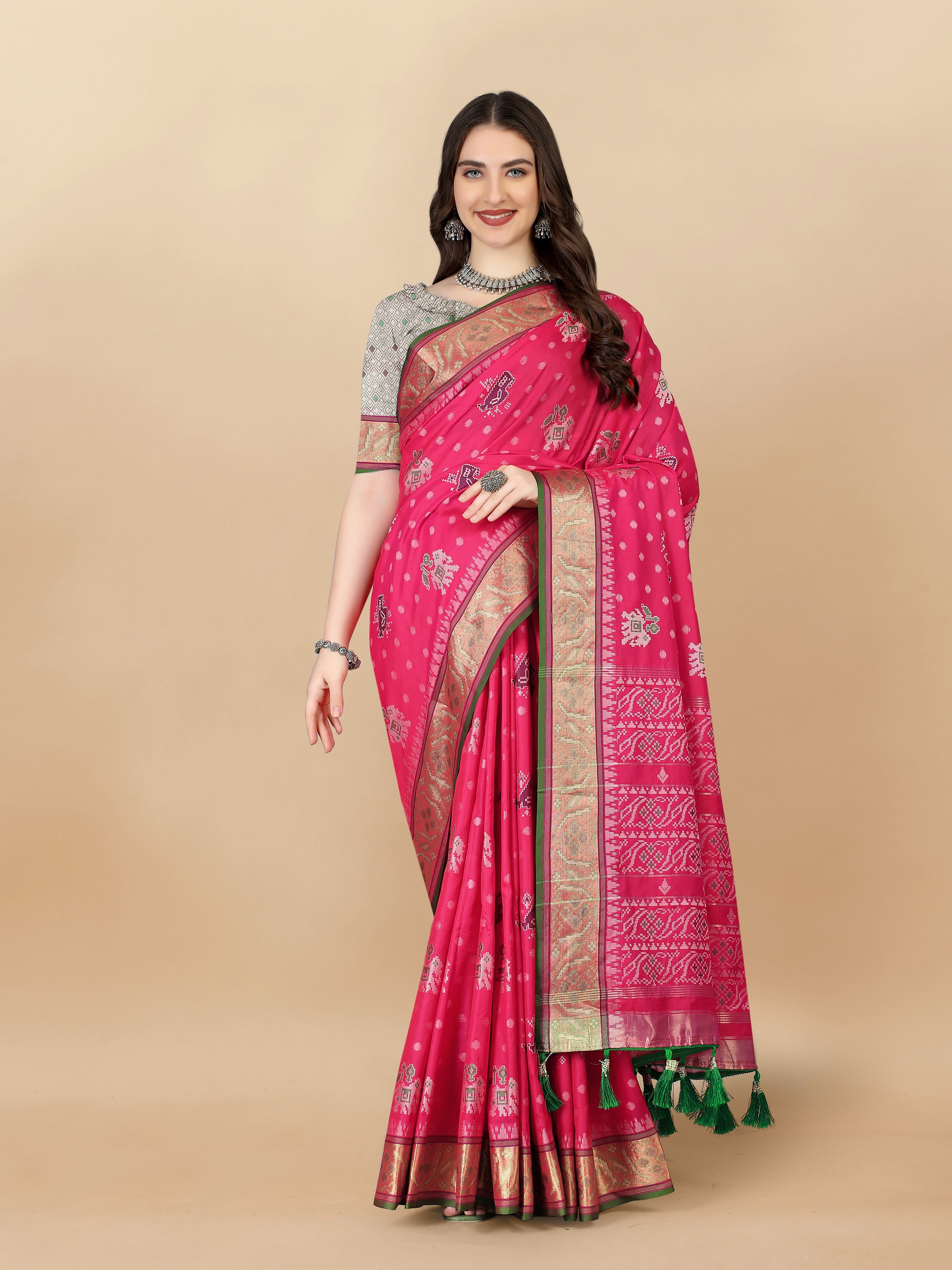 Magenta soft silk Patola woven saree with rich golden Zari pallu and matching blouse piece