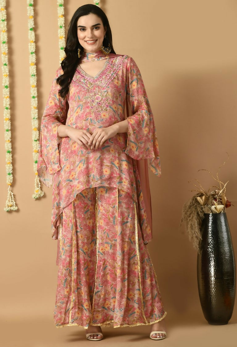 Rose gold Chinnon kurta set with a sheer organza dupatta for festive ethnic styling.
