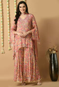 Rose gold Chinnon kurta set with a sheer organza dupatta for festive ethnic styling.