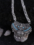 Oxidized silver long necklace featuring Laxmi Mata pendant and turquoise stone detailing