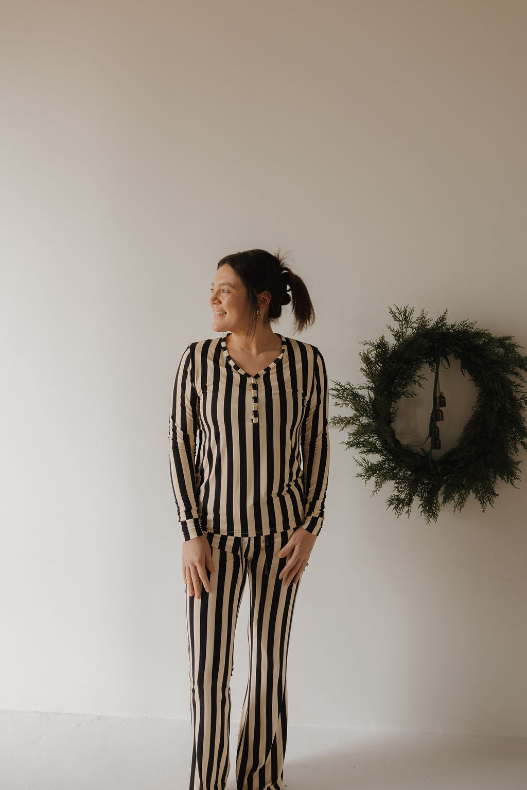 Women wearing long sleeve Midnight Stripe bamboo pajamas for comfortable loungewear