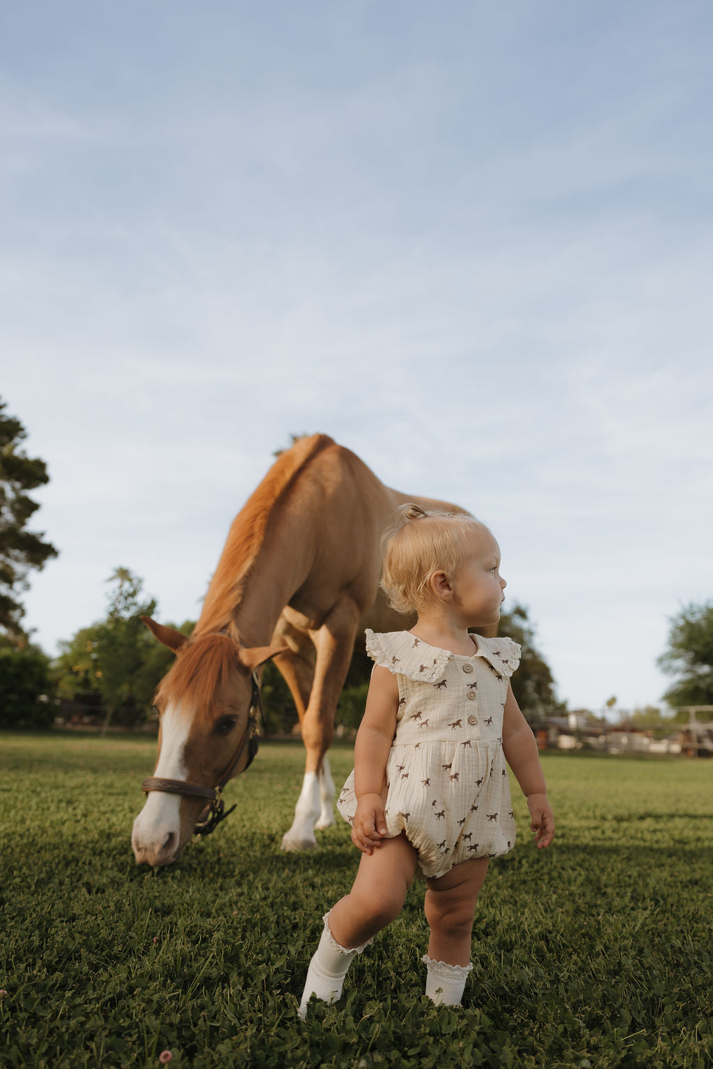 Wild Horses Muslin Baby Romper in Cream Cotton - Image 3