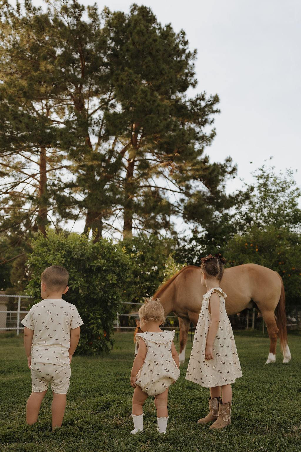 Wild Horses Muslin Baby Romper in Cream Cotton - Image 11