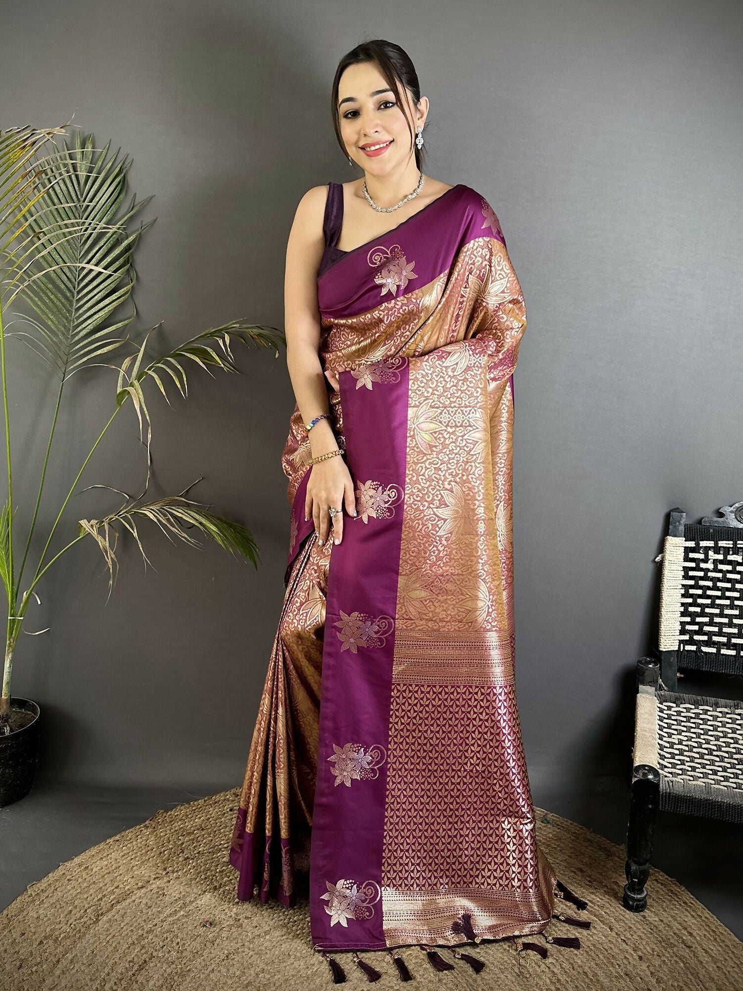 Rich wine colored Dharmavaram saree with intricate gold zari weaving and silk blend blouse.