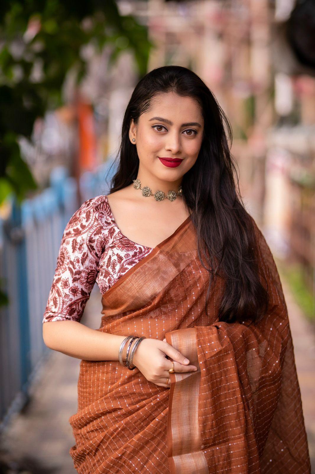 Brown Linen Saree with Self-Weaving Checks and Golden Pattu Border