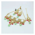 Traditional gold, mint-green, and pink Kundan stone necklace set
