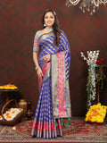 Purple soft silk saree featuring gold Zari Leheriya pattern with Meenakari border and tassels.