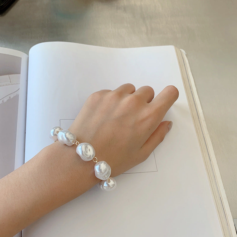 Four-Row Pearl Link Chain Bracelet in Gold-Tone Metal