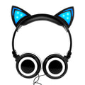Purple kids headphones with glowing cat ears and 85dB volume protection