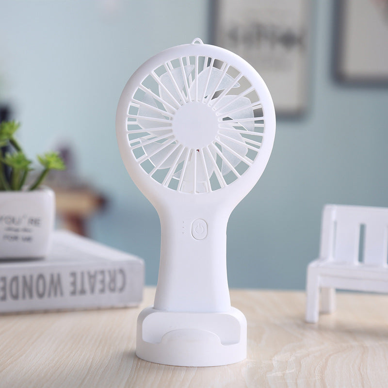 Cute rechargeable portable handheld fairy wand fan in a white aesthetic
