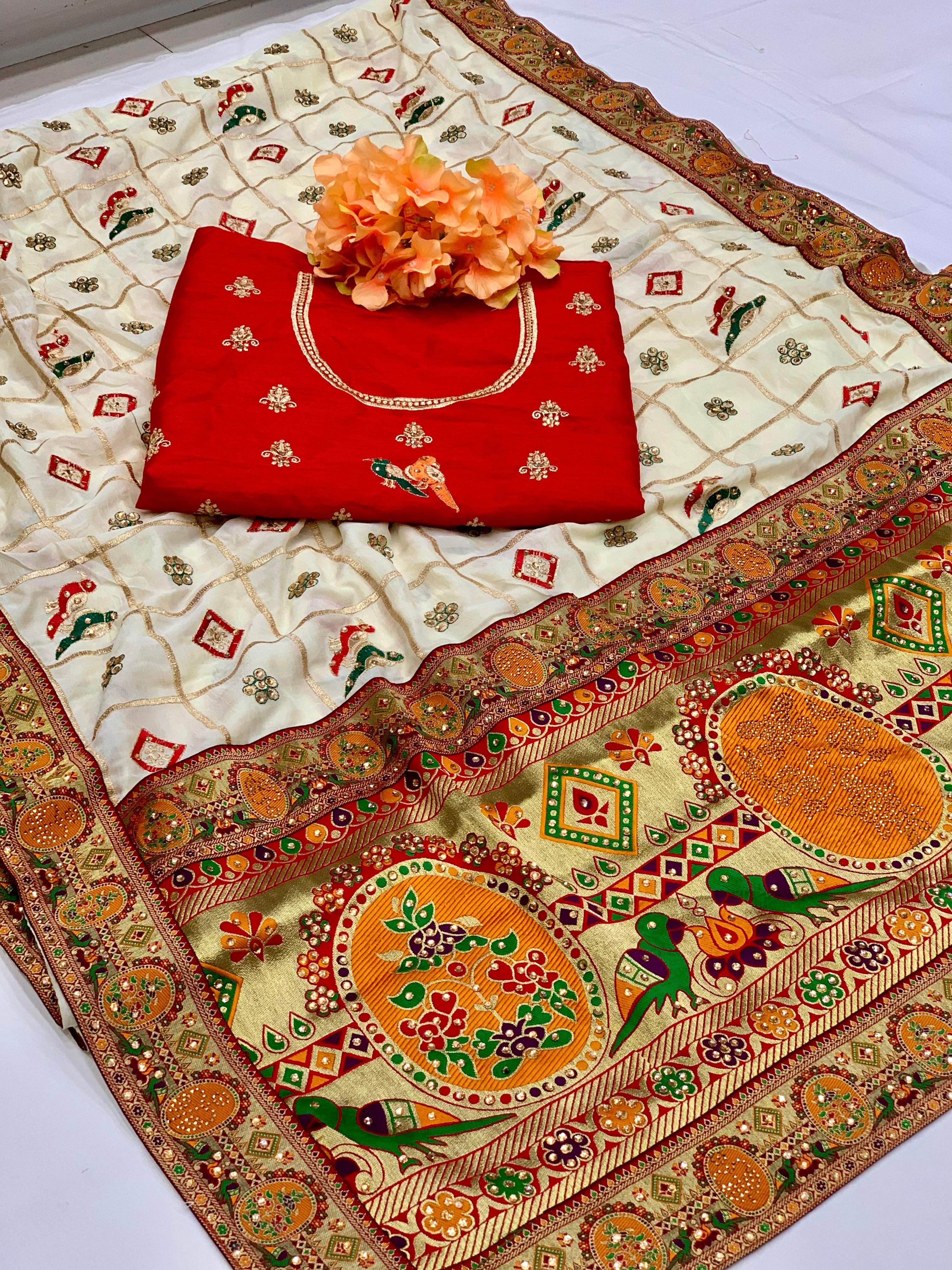 White Vichitra silk saree with detailed embroidery and diamond work