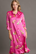 A chic animal print button-down midi shirt dress with a side slit.