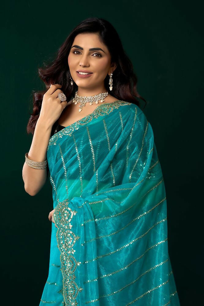 Turquoise Blue Net Party Wear Saree with Black Velvet Blouse