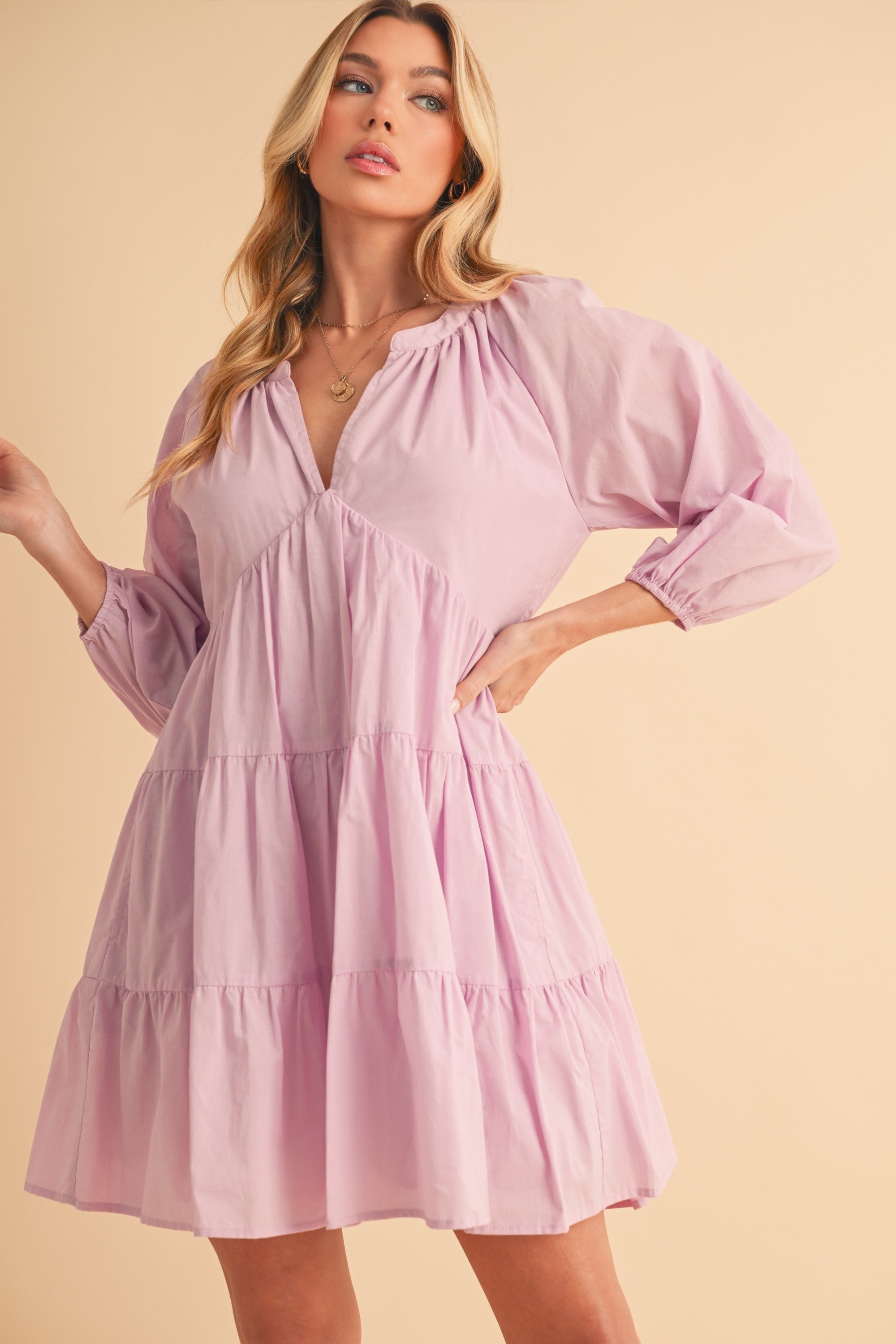 Lavender cotton mini dress with tiered skirt and statement balloon sleeves