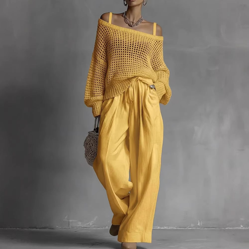Model wearing a two-piece set featuring a yellow hollow-out long sleeve knit top and matching wide-leg linen trousers.