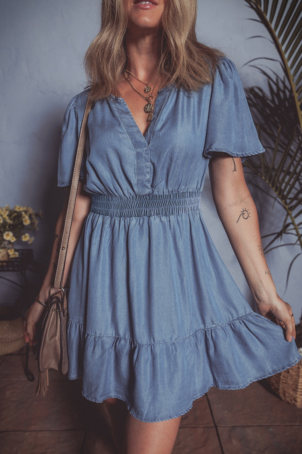 Ruffled Hem Smocked Flutter Sleeve Denim Mini Dress