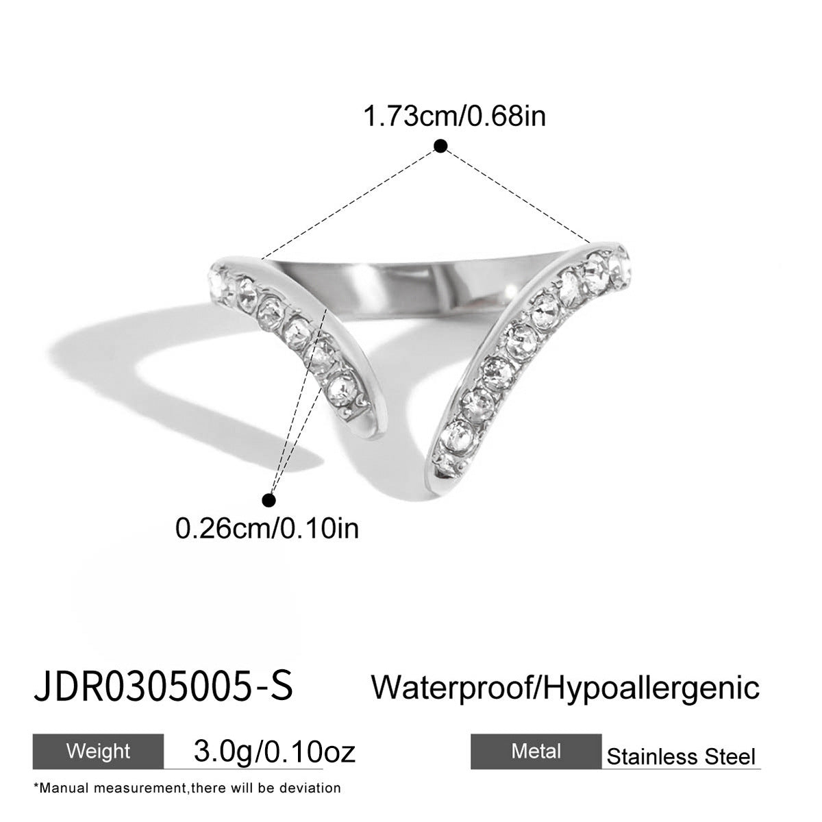 Close-up of a geometric stainless steel open ring with zircon accents