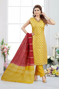Mustard jacquard kurta set with a vibrant red dupatta