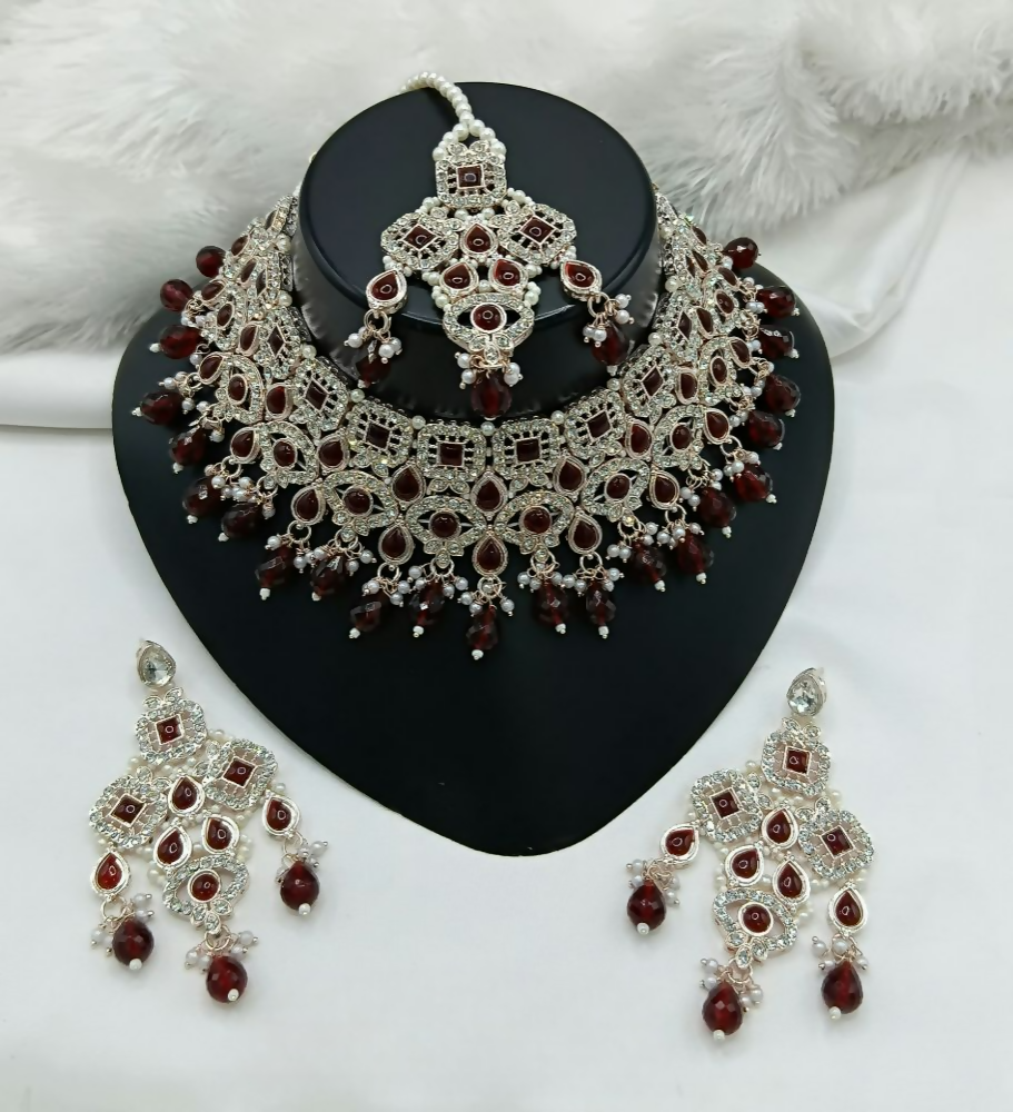 Elegant maroon stone work necklace set with matching ethnic earrings