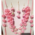 Muskan Pink Flower Jewelry Set featuring elegant floral design pieces
