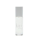 Rose perfume oil roll-on vial in minimal clear glass packaging.