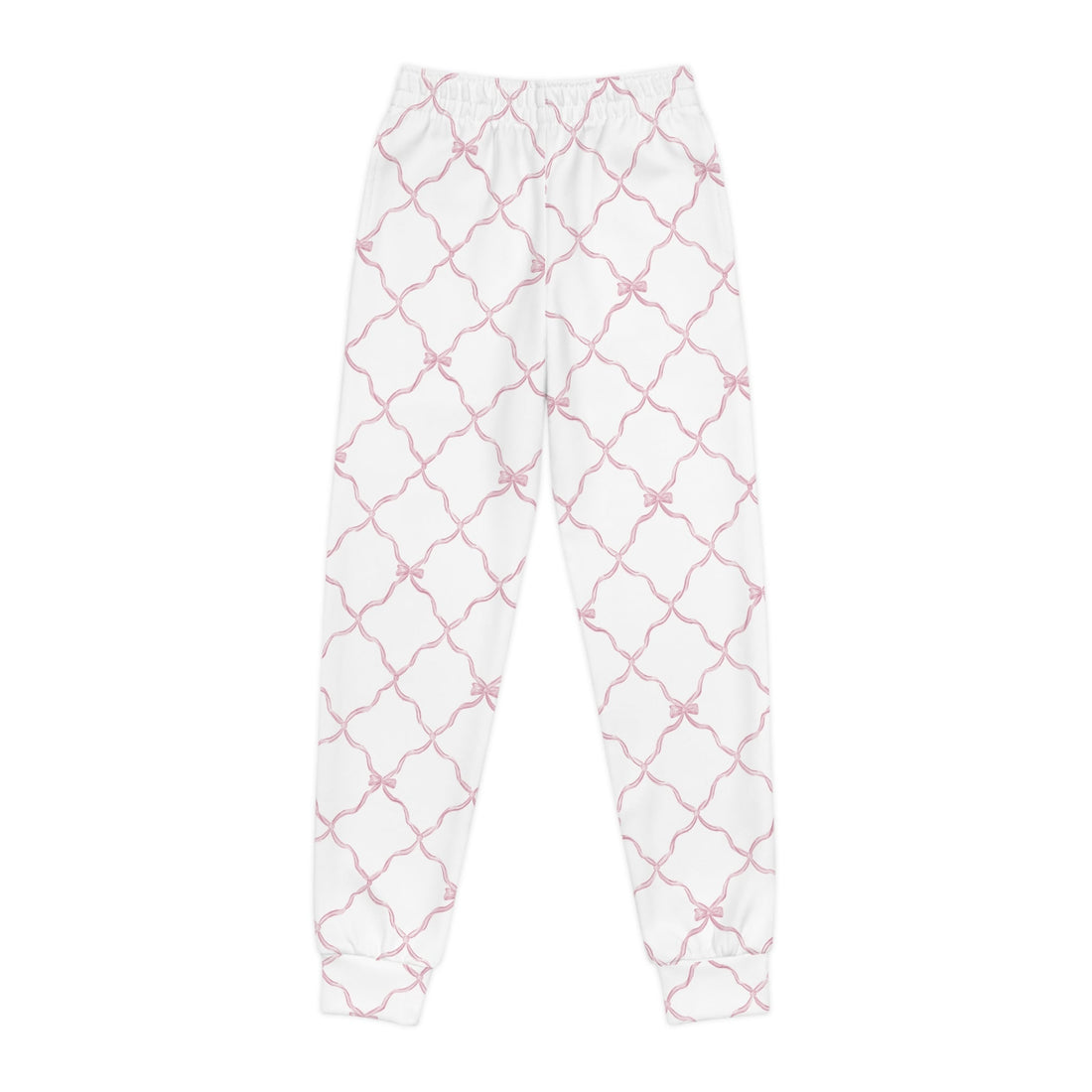 A pair of white youth joggers featuring a pink trellis and bow print pattern on a white background, viewed from front and side profiles.